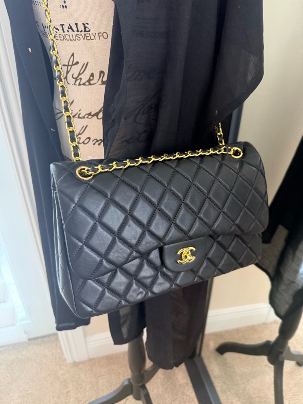 DH Gate quilted lamb skin shoulder or cross body bag. Look is “80’s vintage”